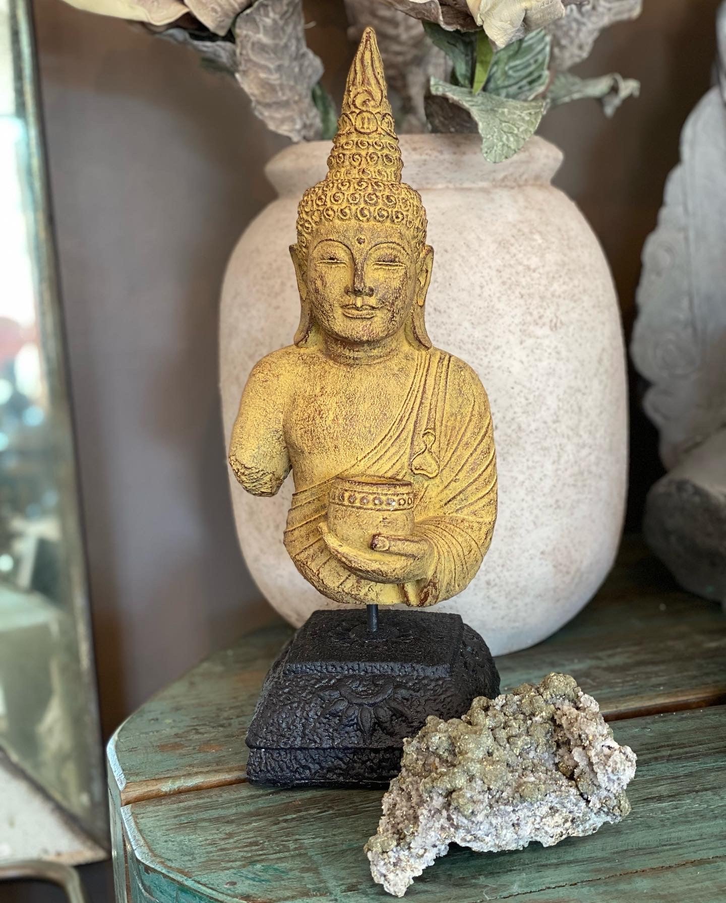 STONE BUDDHA ON STAND
